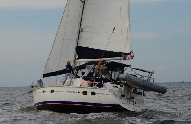 ‘Midnight Sun II’, a Hunter 42, was dismasted at midnight and motored back to Pensacola Yacht Club (PYC) by 8:30 AM CST. The crew loaded all their gear on the Beneteau 473 'Trasea' owned by crew members Larry and Tracy Cost to start out again for Cuba Sunday afternoon. © Talbot Wilson